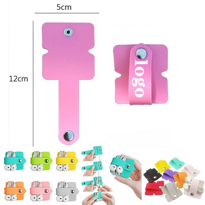 Silicone Earbud Cord Organizer With Snap Closure